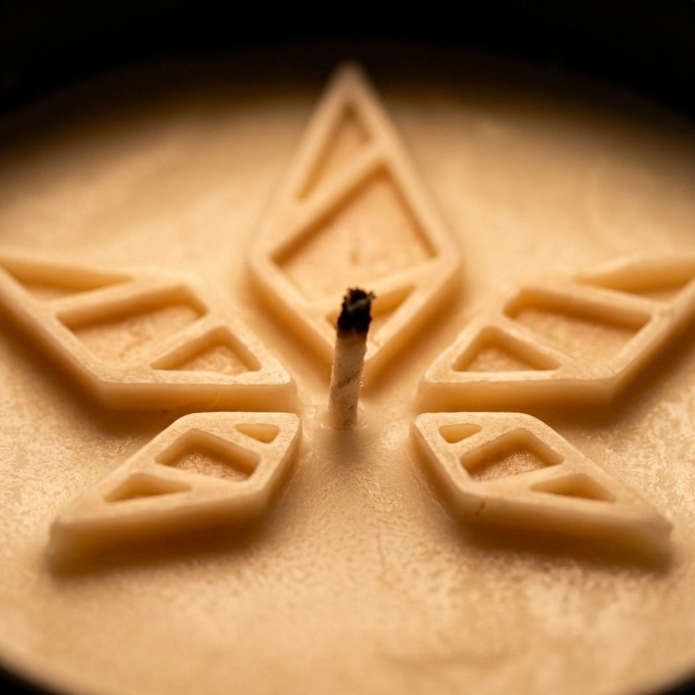 Close-up of The Gilded Wick x Stellenleaf massage candle gold wax art detail — luxury ritual candle | Stellenleaf